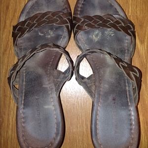 Previously owned brown shoes