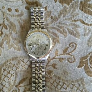 Silver and gold watch priced to sell