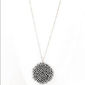Rhodium swirl necklace