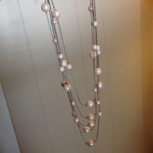 Free with any purchase. Light pink necklace