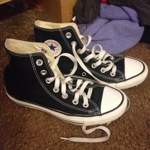 Black and white high top converse