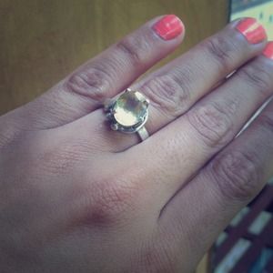 Silver band with yellow gem ring
