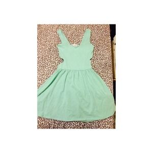 Teal dress w| open back .