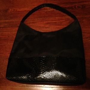 Big black purse with embossed animal print trim