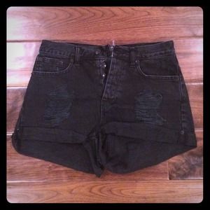Black ripped high waisted shorts.