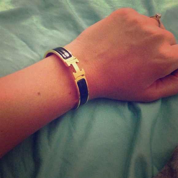 Authentic Black and gold Hermes bracelet.