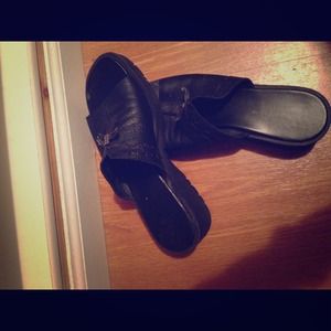 Previously owned black sandals
