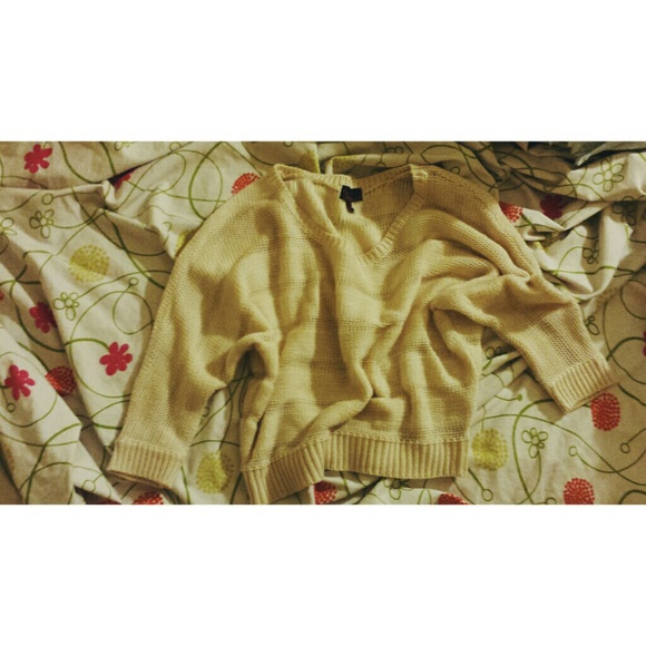 Cream crop knit top.