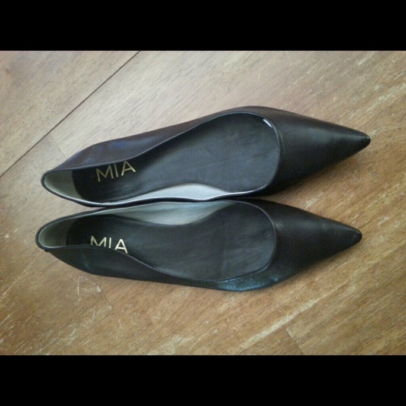 Dark brown leather flats