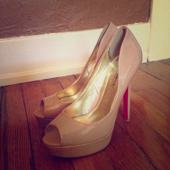 Nude open toe pumps
