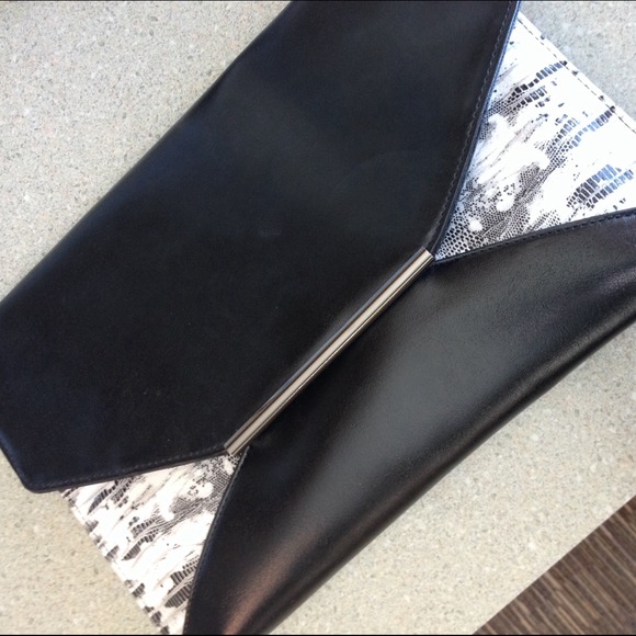 Black clutch with cute snake skin detail