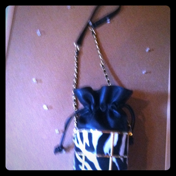 Over shoulder drawstring zebra/gold purse