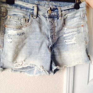 High waisted; slightly destroyed; light wash