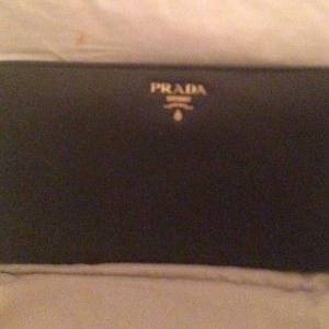 Authentic Prada with gold snaps