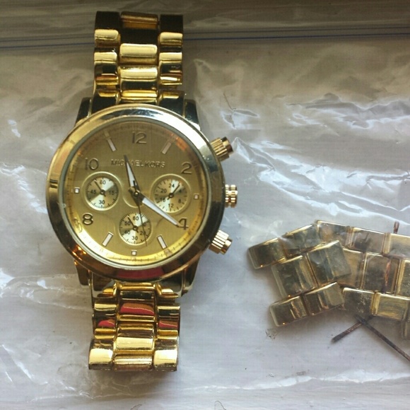 MK gold watch