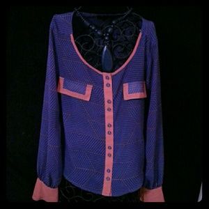 Sheer blue and burnt orange shirt.