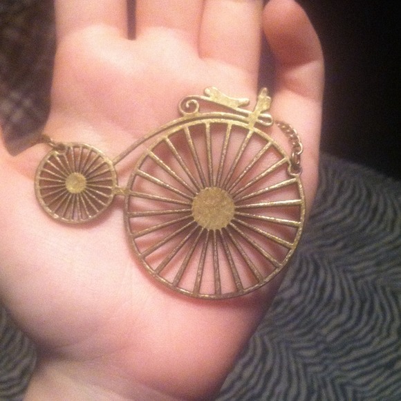 Long, antique Tricycle necklace