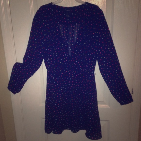 Sheer long-sleeve geometric patterned dress.