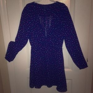 Sheer long-sleeve geometric patterned dress.