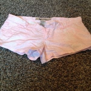 Light pink shorts with floral design