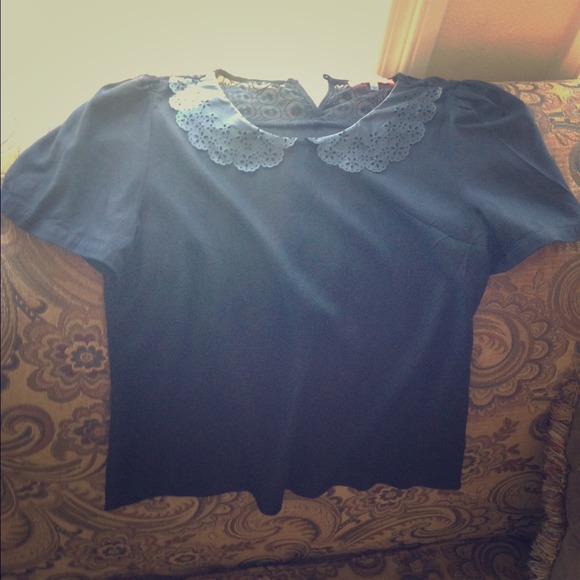 Black pleather scalloped collared shirt.