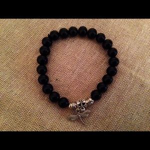 Onyx stretch bracelet w/ butterfly charm