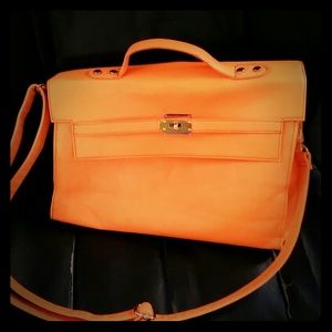 Neon purse. Good condition expect some stains