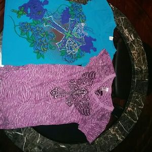 Two graphic cross shirts with designs