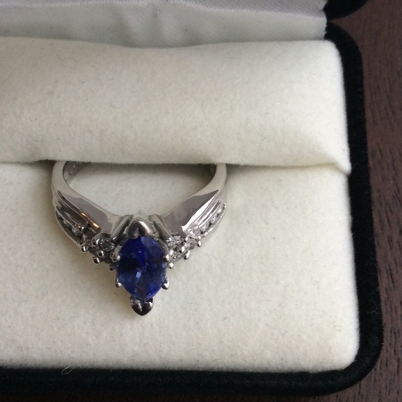 Genuine tanzanite and diamond ring