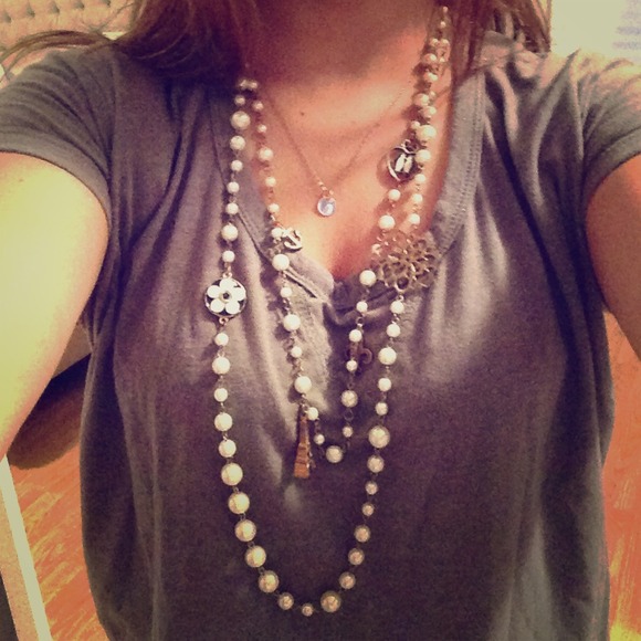 Long pearl necklace with charms