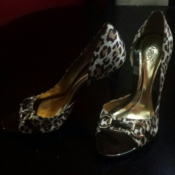 Carlos Santana cheetah print heels