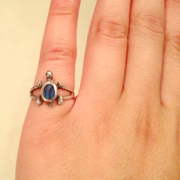 Silver turtle ring with sapphire blue stone