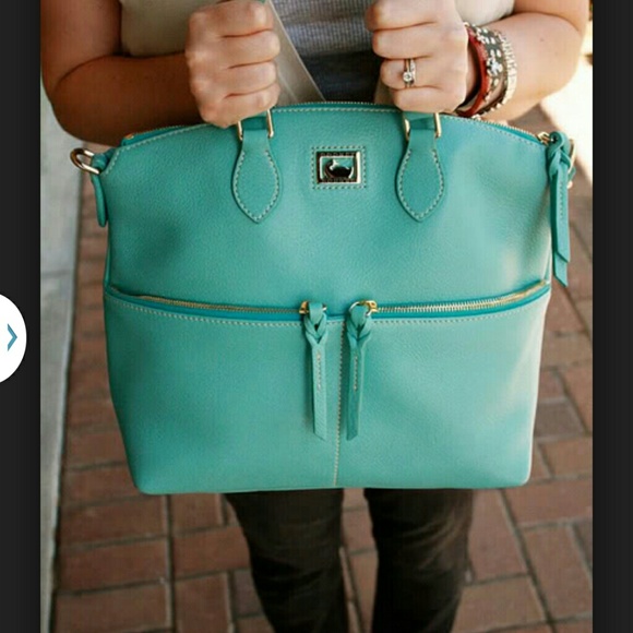 Authentic Torquoise Dooney and Burke.....pre loved