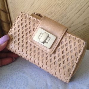 Cute little fashionable wristlet.