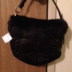 Never used, with tags Coach purse
