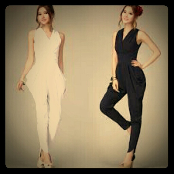 Reduced!!!White jumpsuit says large but runs small