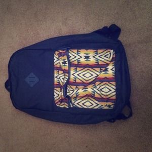 Tribal print navy blue backpack.