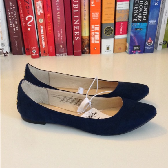 Blue flats with studded heel