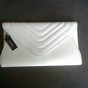 SOLD - Solid white clutch with optional chain