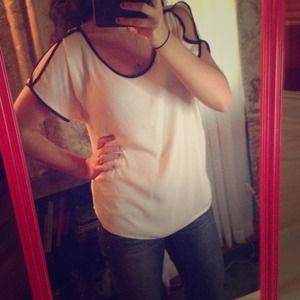 White top with black accents