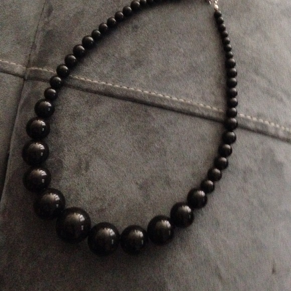Black round plastic beaded necklace