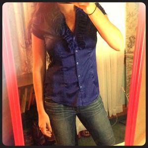 Blue blouse with flower ruffles