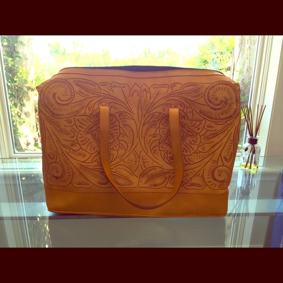 Hand carved leather bag