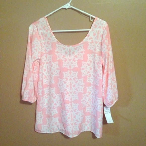 Bow back top. New with tags.