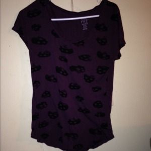 skull purple & black shirt.