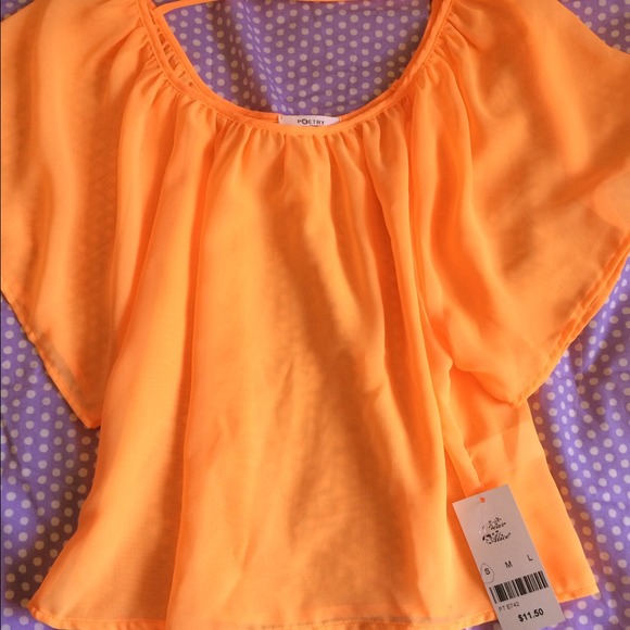 Bright orange top