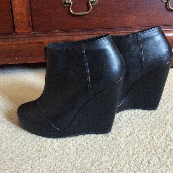 Black wedge booties