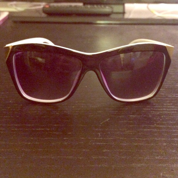 Black lense, black/white lenses with gold corners.
