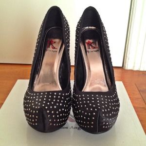 Black pumps with studs