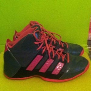 Gray and pink Adidas basketball shoes